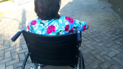 Old senior women with disabilities in the wheel chair