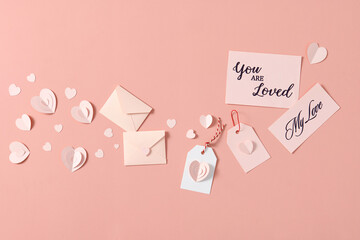 Love message with pink envelope and blank form on a beige