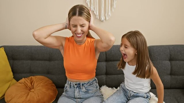 A frustrated woman and yelling girl in a living room, depicting family stress with expressive faces and a cozy home interior.
