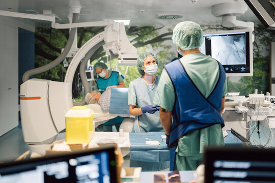 Two surgeons talking in hospital