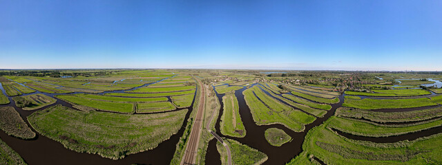 Railroad railway and bicycle cycle path - green transport, Europe