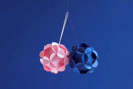 Pink and blue floral balls from cardboard for springtime decor