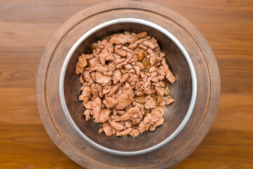 Food for animals background. wet cat and dog food texture, pattern. Pet meal background close up. wet food for pet dogs and cats. Dried pet food top view. Granules of good nutrition for dogs and cats.