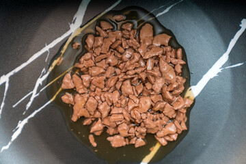 Food for animals background. wet cat and dog food texture, pattern. Pet meal background close up. wet food for pet dogs and cats. Dried pet food top view. Granules of good nutrition for dogs and cats.