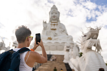 Taking photos at Wat Huay Pla Kang.