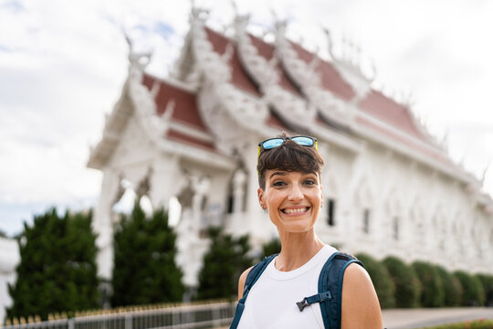 Happy female traveler at Chiang Rai.