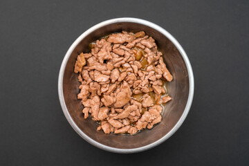 Food for animals background. wet cat and dog food texture, pattern. Pet meal background close up. wet food for pet dogs and cats. Dried pet food top view. Granules of good nutrition for dogs and cats.