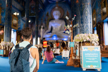 Woman in the Blue Temple at Chiang Rai.