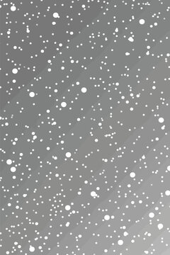a black and white photo of snow falling