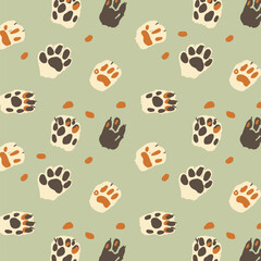 a pattern of paw prints on a green background