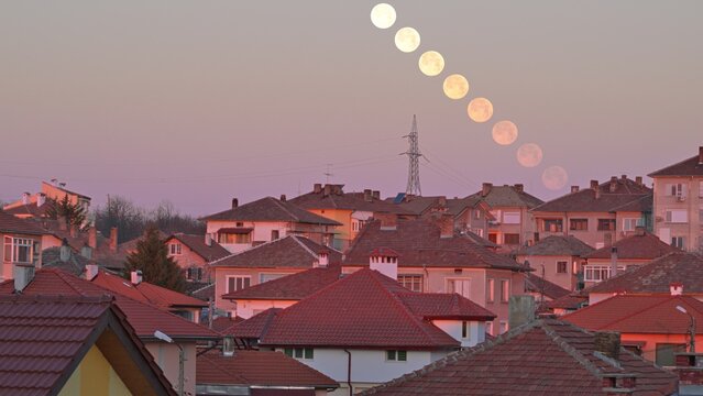 Multiple exposures of the morning sky showing the moon's path