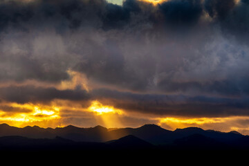 Sunset, sunrise over mountains, storm, clouds