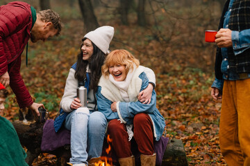Family around campfire