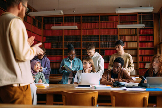 Professor applauding to his students