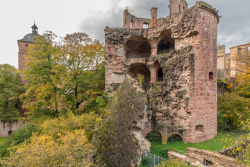 Dramatic view on the expoded tower or herb tower from the famous Heidelberg castle. Tower used to...