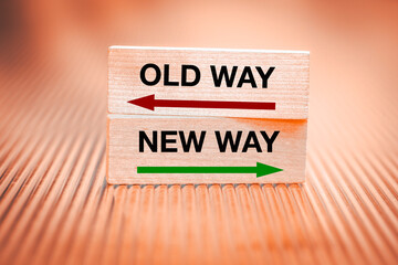 New way vs old way. Concept, New opportunities, direction of development, Written on wooden blocks, Fiery background - 783336326