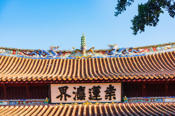 The Dragon and Pagoda on the roof of the main hall of Kaiyuan Temple in Quanzhou, Fujian, China