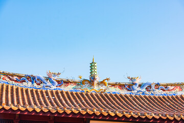 The Dragon and Pagoda on the roof of the main hall of Kaiyuan Temple in Quanzhou, Fujian, China