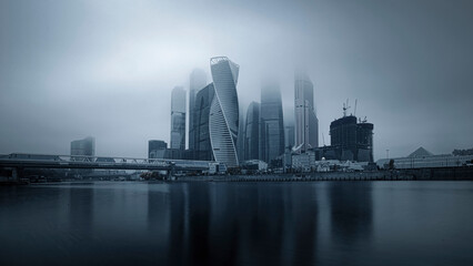 Moscow, Russia - November 3, 2020: Heights in the fog. Buildings of the business center Moscow City in a cityscape.