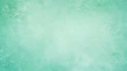 Mint green color. A serene, pastel green textured background with a soft gradient effect perfect...