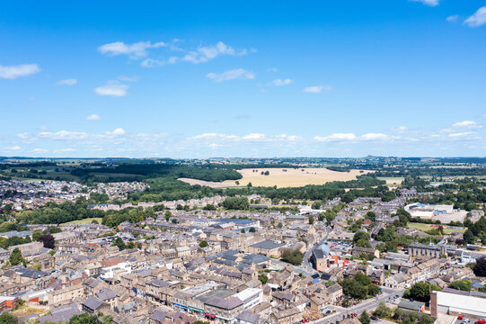 Aerial photos of the British town of Otley in West Yorkshire in the UK, showing houses and streets in the town on a sunny day in the summer time
