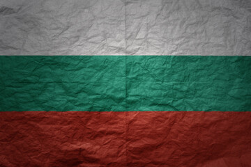 big national flag of bulgaria on a grunge old paper texture background