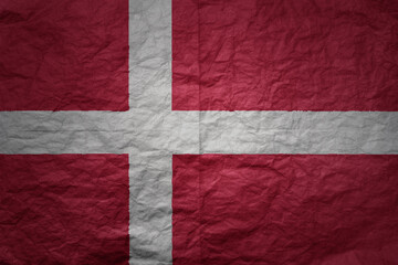 big national flag of denmark on a grunge old paper texture background
