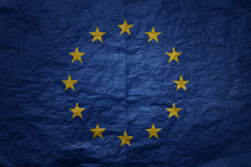 big national flag of european union on a grunge old paper texture background