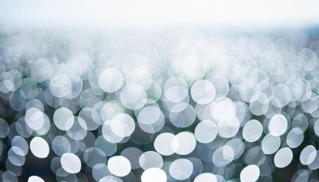 white and gray bokeh background photo can be used for the concepts of new year christmas wedding anniversary and all celebrations