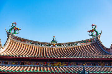 Fototapeta na wymiar Roof sculpture of Tianhou Palace in Quanzhou, Fujian, China Ancient pagoda of Kaiyuan Temple in Quanzhou