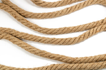 Closeup of multiple pieces of rope isolated on white background