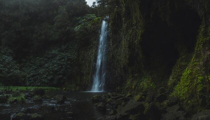Fototapeta na wymiar waterfall at parque natural da ribeira dos caldeiroes sao miguel azores portugal