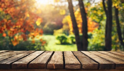 wooden table and blurred garden autumn nature background