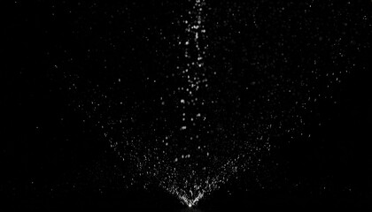 abstract splashes of water on a black background freeze motion of white particles rain snow overlay...