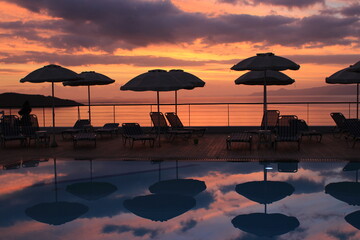 fabulous sunrise by the pool by the sea