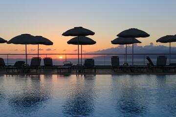 fabulous sunrise by the pool by the sea