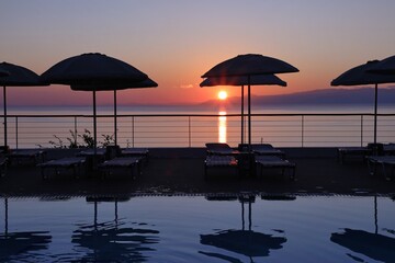 fabulous sunrise by the pool by the sea