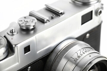 The rare old rangefinder film camera with lens on white background. - obrazy, fototapety, plakaty