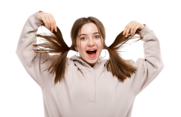 Teenager girl. Young, beautiful smiling teen with pigtails hairstyle. Happy student. Modern Girl in hoodie isolated. Studio portrait. PNG.