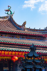 Fototapeta na wymiar Roof sculpture of Tianhou Palace in Quanzhou, Fujian, China Ancient pagoda of Kaiyuan Temple in Quanzhou