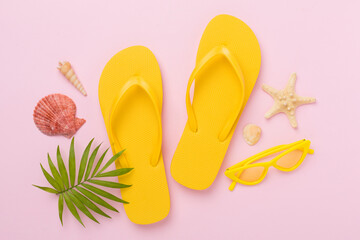 Bright yellow flip-flops on color background, top view. Summer concept - obrazy, fototapety, plakaty
