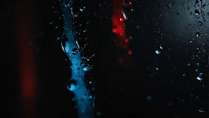 Fotobehang red and blue to dark black background with water drops from Generative AI © SevenThreeSky