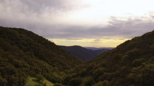 Aerial view from the moutains of sunset over the ocean in Orange County, California