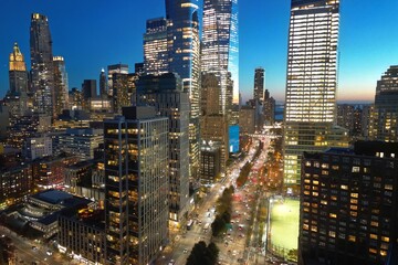 Aerial view of big city at night New York City. Night NY City panorama skyline at twilight....