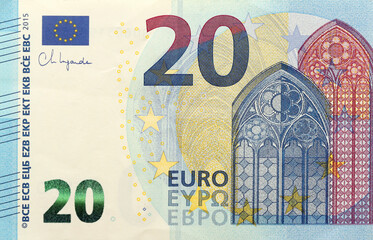Fragment of one twenty euro money bill. Details of European union currency banknote of 20 euro...
