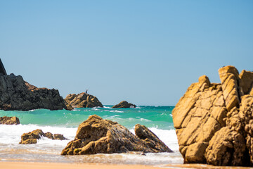Fisherman casting from the rocks in Jersey, Channel Islands