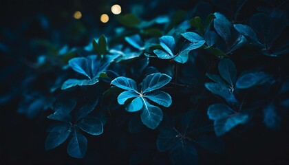 a close up of a bunch of blue leaves with a lot of green leaves in the middle of the picture - obrazy, fototapety, plakaty