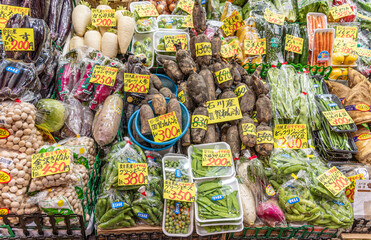 A variety of fresh vegetables for sale at Omicho Market in Kanazawa, Japan