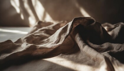 abstract neutral background crumpled draped linen fabric texture on sun light with soft shadows aesthetic sustainable bohemian backdrop copy space