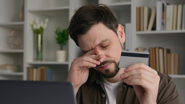 Confused Caucasian businessman frustrated man male office employee upset guy pay online on laptop rejected bank credit card limit problem wrong password fail business transaction error money balance
